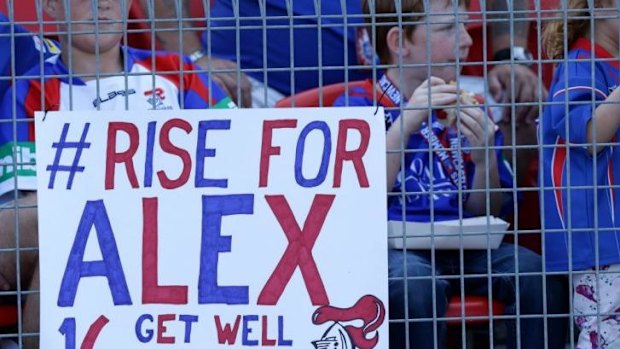 Fans show their support for stricken Newcastle player Alex McKinnon.