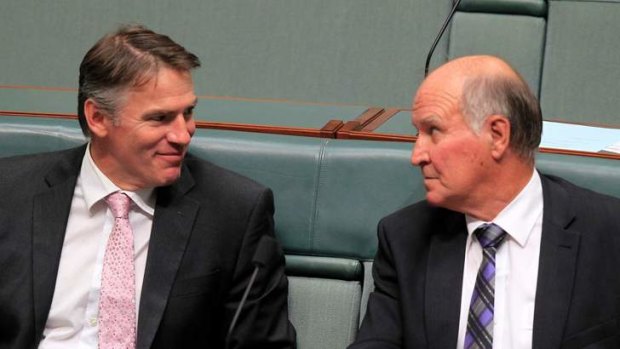 Independent MPs Rob Oakeshott, left, and Tony Windsor are angry at a deal between Labor and the Coalition on political funding.