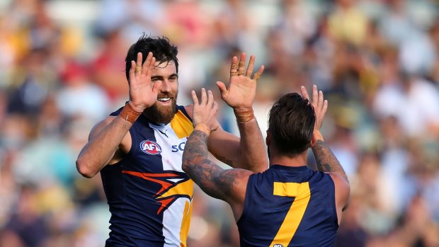 PERTH, AUSTRALIA - MAY 11: Josh Kennedy of the Eagles and Chris Masten of the Eagles celebrates a goal during the round eight AFL match between the West Coast Eagles and the Greater Western Sydney Giants at Patersons Stadium on May 11, 2014 in Perth, Australia.  (Photo by Paul Kane/Getty Images)