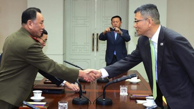 Thaw in relations: North and South Korean delegations meet earlier this week.