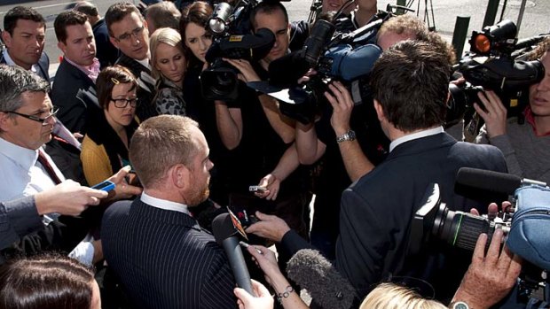 Tim Meehan, the lawyer for the man accused of murdering Daniel Morcombe, speaks with the media outside court.