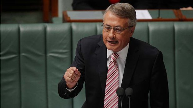 Treasurer Wayne Swan under pressure to explain how billions in new spending will be paid for by the government's mining tax.