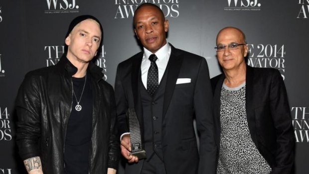 Eminem with Dr. Dre and Jimmy Iovine, who sold Beats Electronics to Apple.