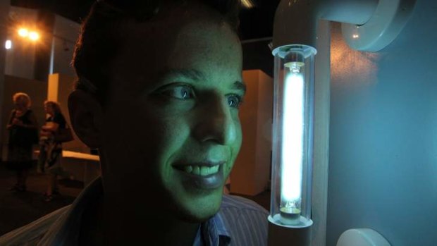 Keeping you safe from superbugs: Paul Cullen with his invention, a self-sanitising door handle.
