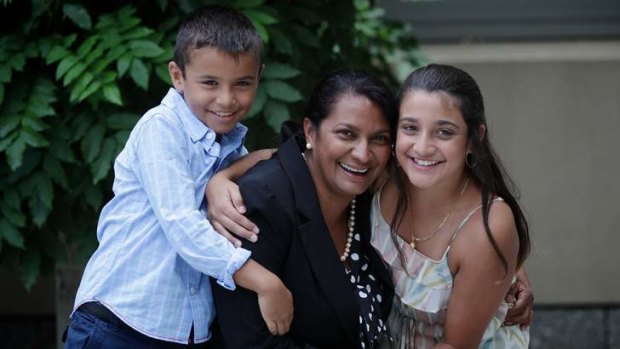 Nova Peris with her children Jack (left) and Destiny (right), at Parliament House in Canberra.