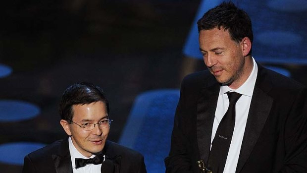 Directors Shaun Tan and Andrew Ruhemann accept the award for Best Animated Short Film for 'The Lost Thing'.