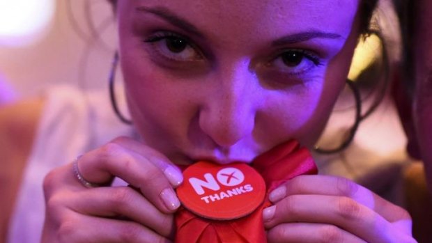 A supporter from the "No" Campaign celebrates at the Better Together campaign headquarters in Glasgow.