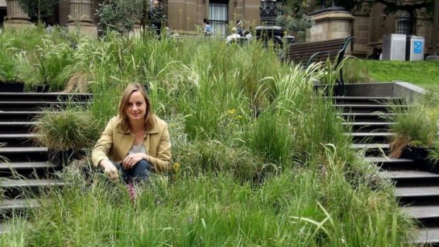 Linda Tegg with the grasses that she’s amassed at the State Library. 