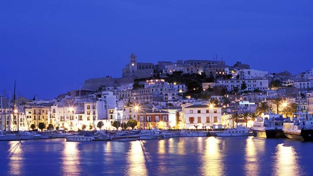 Ibiza town harbour at dusk.