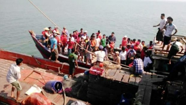 Survivors of a ferry tragedy, which killed at least 33 people in Myanmar on Friday, March 13, are brought to safety.