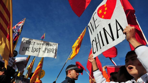 China supporters and Free Tibet protesters face off  at the 2008 Olympic torch relay in Canberra.