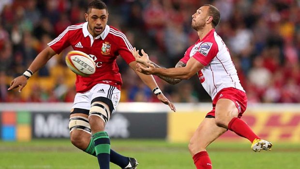 Over and out: Quade Cooper tried hard against the Lions on Saturday.