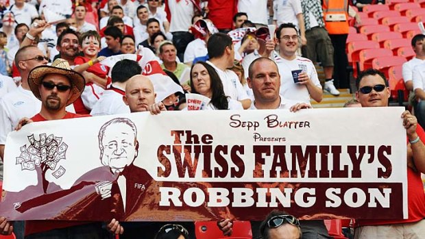 Angry: English fans protesting against FIFA president Sepp Blatter.