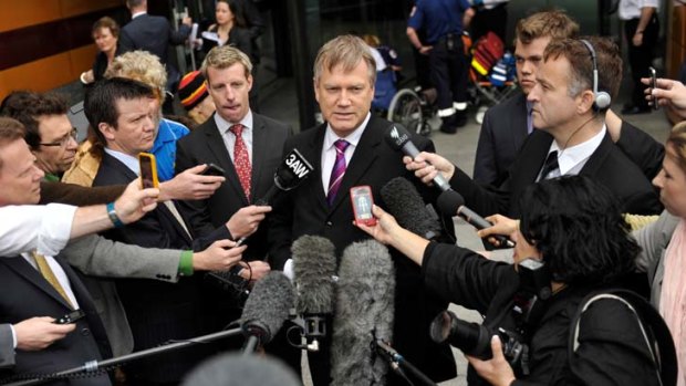 Andrew Bolt speaking to media after losing his court case.