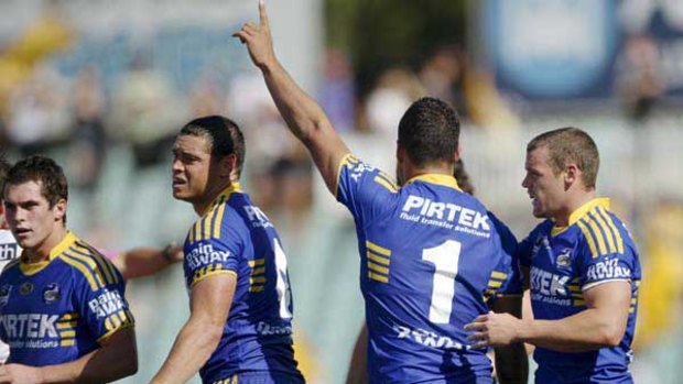 Point taken . . . Eels fullback Jarryd Hayne raises his arm in victory after steering his team to a comeback win over Manly at Parramatta Satdium yesterday.