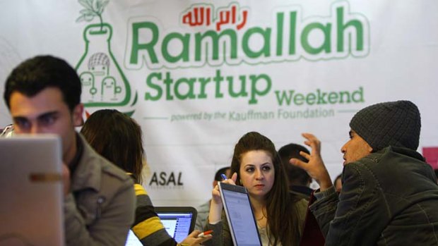 Palestinian programmers attend a Ramallah Start-up Weekend workshop in the West Bank city of Ramallah.