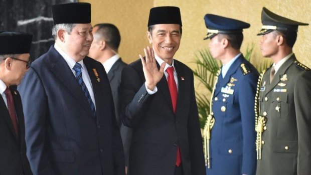 Outgoing president Susilo Bambang Yudhoyono and Joko Widodo  arrive before the ceremony.