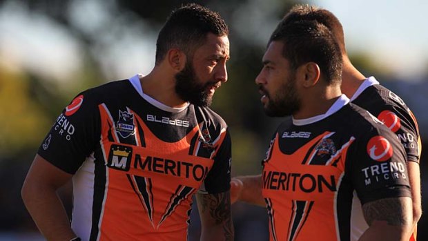 Tough day ... Benji Marshall is consoled by teammates after being moved to tears during a minute's silence