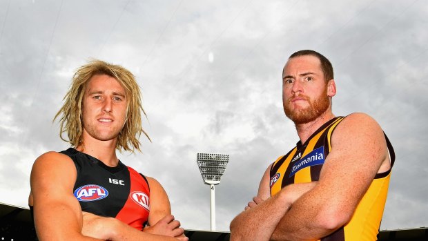 Opposing captains Dyson Heppell and Jarryd Roughead.