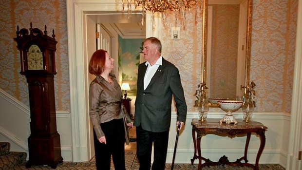 Julia Gillard is greeted by Australian ambassador to the US Kim Beazley at Blair House in Washington at the start of her US tour.