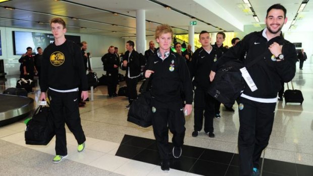 Tuggeranong United players arrive back at Canberra Airport on Wednesday afternoon.