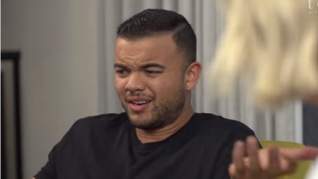 Guy Sebastian appeared unimpressed with his wife's questioning.
