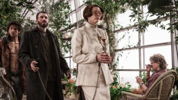 Tilda Swinton and Chris Evans in Bong Joon-Ho's <i>Snowpiercer</i>.