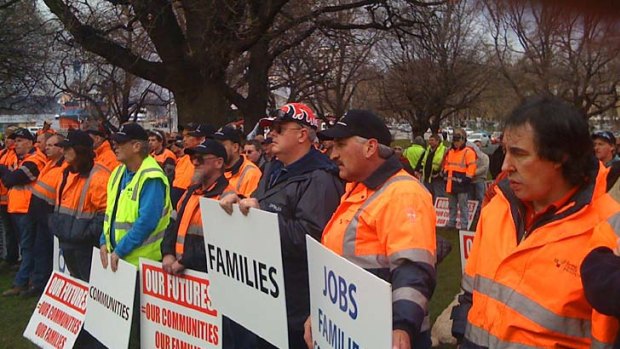 Timber workers rally in Hobart calling for government help.
