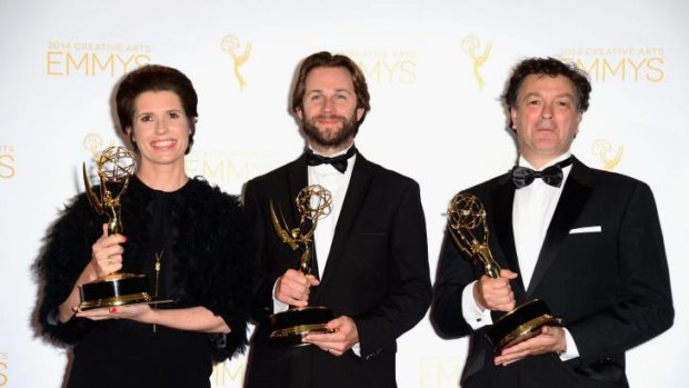 Production designer Deborah Riley, art director Paul Ghirardani and set designer Rob Cameron after winning their Creative Arts Emmys.