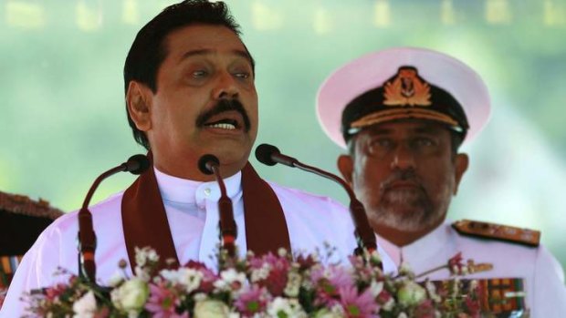 Admiral Thisara Samarasinghe, (behind Sri Lankan President Mahinda Rajapaksa) has dismissed the findings of a report alleging war crimes.