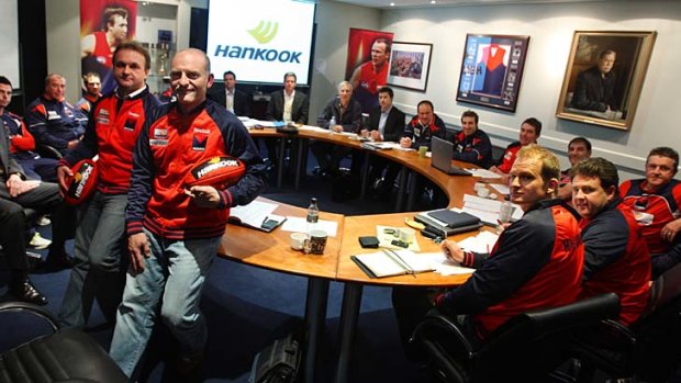 Key members of Melbourne's football department meet in 2009.