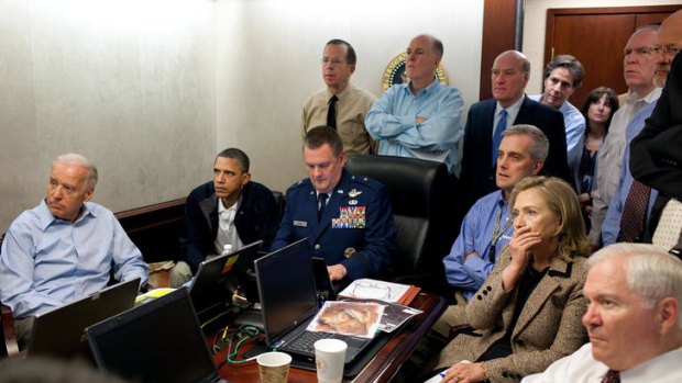 US President Barack Obama, second left, Vice-President Joe Biden, left, along with members of the national security team, receive an update on the mission against Osama bin Laden in the Situation Room of the White House on Sunday, May 1, 2011.