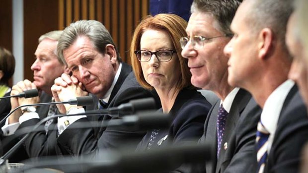 Unamused: Prime Minister Julia Gillard with premiers Colin Barnett, Barry O'Farrell, Denis Napthine and Campbell Newman at the COAG meeting.