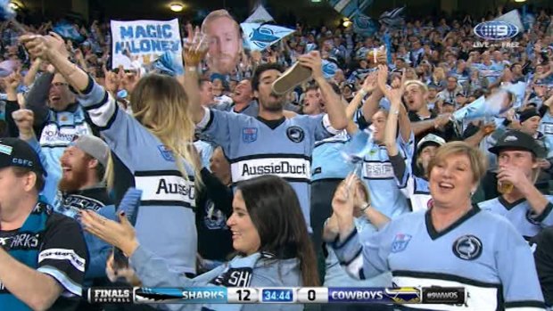 Shoe-in of the week: A Cronulla fan does a 'shoey' after Chad Townsend's first half try.