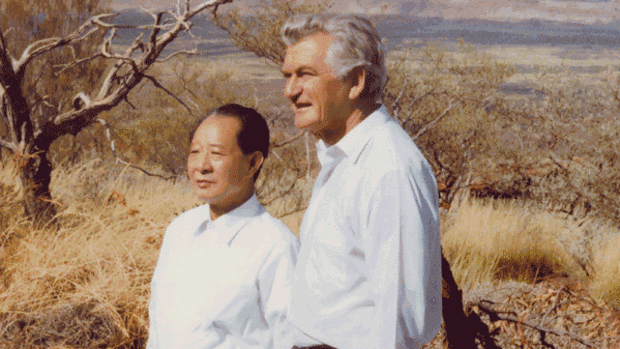 Men of steel: Hu Yaobang and Bob Hawke survey the Pilbara's mountains of iron in 1985.