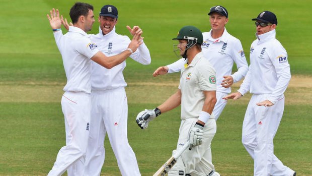 James Anderson (left) celebrates the wicket of Shane Watson during day four of the second Ashes Test at Lord's.