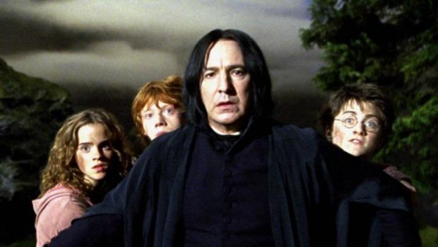Alan Rickman as Severus Snape in <i>Harry Potter and the Prisoner of Azkaban</i>, along with fellow cast members Emma Watson, Rupert Grint and Daniel Radcliffe.