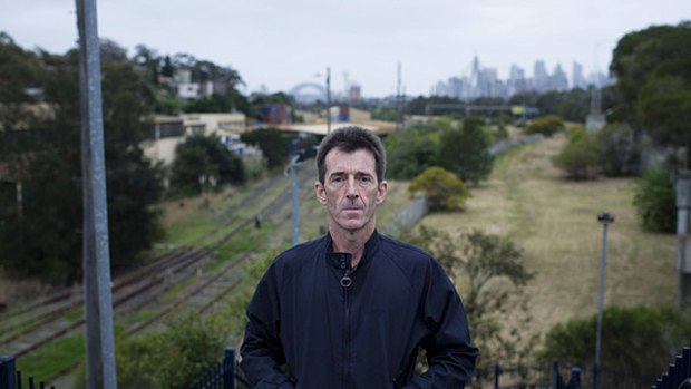 Mark Wallis stands over the unused rail land in Lilyfield.