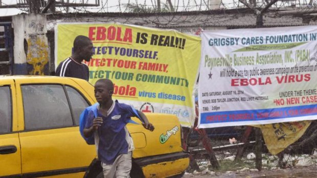 Ebola virus health warning signs in the Liberian capital of Monrovia.