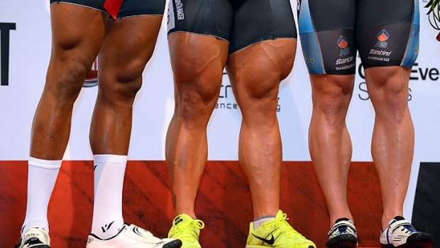Thunder thighs: Robert Forstemann of Germany (centre) stands alongside Nicholas Njisane of Trinidad (left) and Shane Perkins.