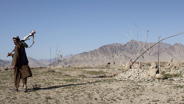 Graveyard on the hill behind Amrullah Khan's house where he and five family members are buried.