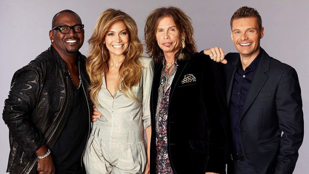 Tyler (second from right) with his former <i>American Idol</i> judges Randy Jackson and Jennifer Lopez, and host Ryan Seacrest.