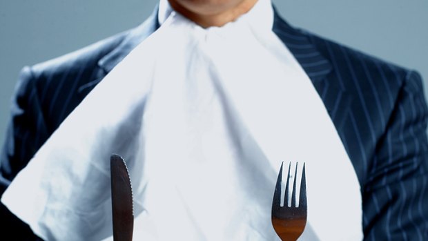 Your napkin goes on your lap, not in your collar.