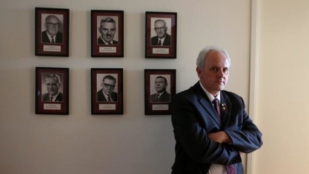 Democratic Labour Party MP no more: Senator John Madigan with portraits of former DLP politicians in his office after announcing he was quitting the party and will continue his term as an independent.