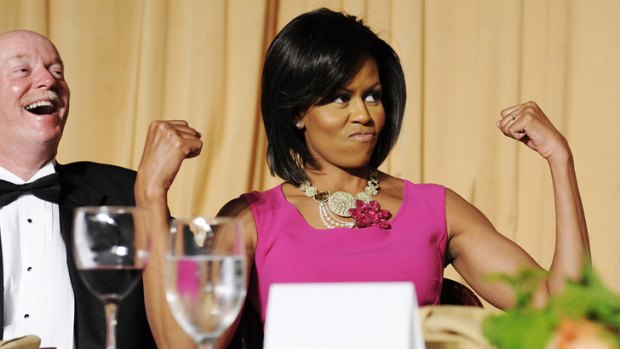 Armed and dangerous ... Michelle Obama shows off her tone.