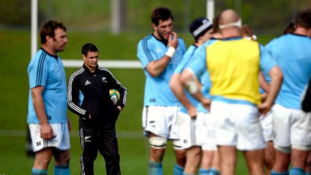 Sidelined: Dan Carter watches on at All Blacks training.