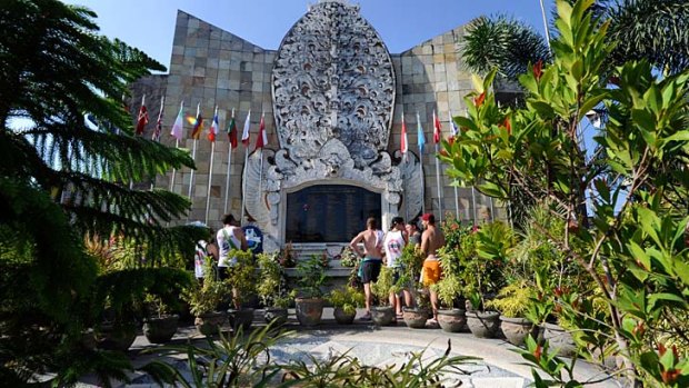 Standing together ... Australians visiting the Bali memorial.