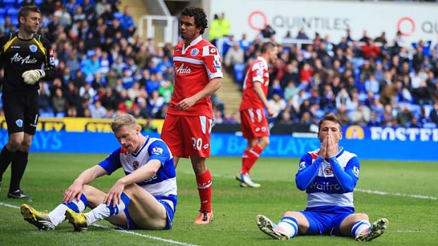 Shared fate: Reading's Pavel Pogrebnyak and Adam Le Fondre look dejected after failing to score against QPR.