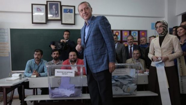 Turkey's Prime Minister Recep Tayyip Erdogan casts his ballot at a polling station in Istanbul.