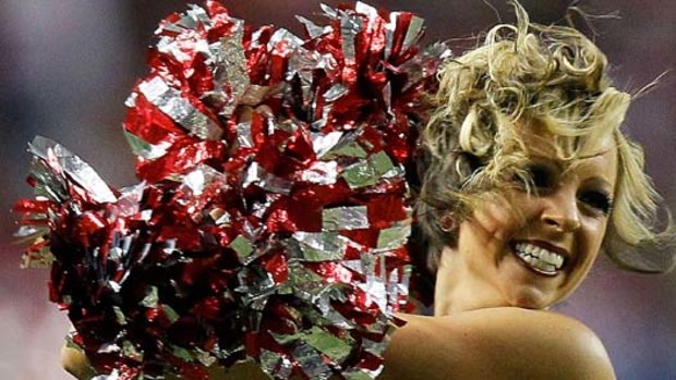 A cheerleader for the Atlanta Falcons performs against the Green Bay Packers during their  NFC divisional play-off game at Georgia Dome on January 15. The Packers do not have their own cheerleaders.